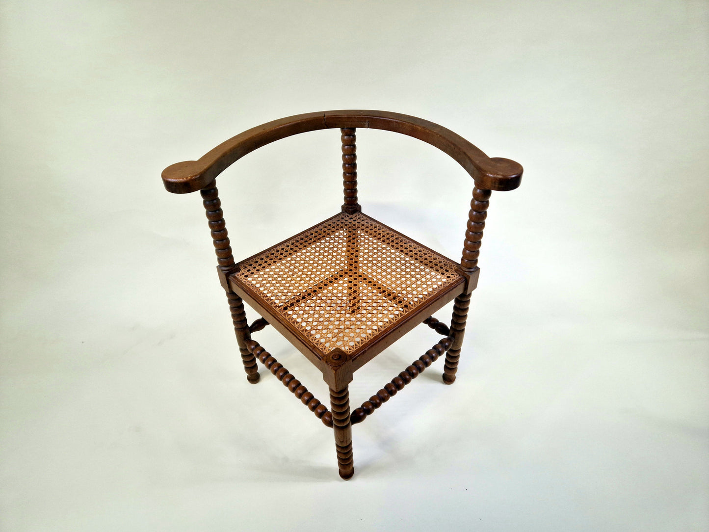 Antique French Bobbin Corner Chair from the 1920s with rattan seat